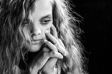 Image showing Psychological black and white portrait of a girl on a black background