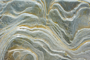 Image showing Texture - wet sea stone, with stains reminiscent of a wave