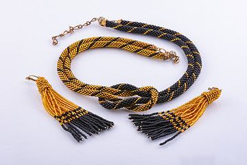 Image showing Handmade necklace and earrings set from small black and gold beads