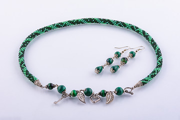 Image showing Handmade designer necklace and earrings made of small beads and stones