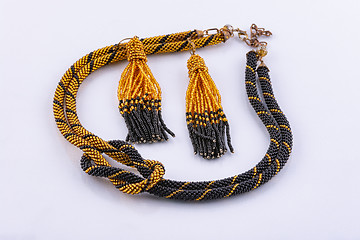 Image showing Necklace made of small beads complete with handmade earrings