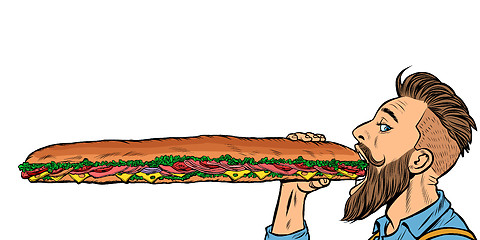 Image showing man eats a long sandwich