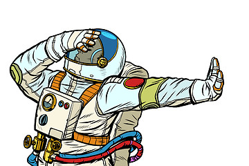 Image showing Astronaut in a spacesuit. Gesture of denial, shame, no