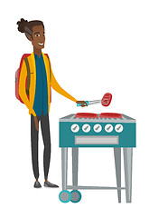 Image showing Traveler man cooking steak on barbecue grill.