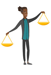 Image showing Young african businessman holding balance scale.