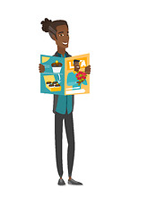 Image showing Young african-american man reading magazine.