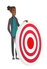 Image showing Young african-american businessman and dart board.