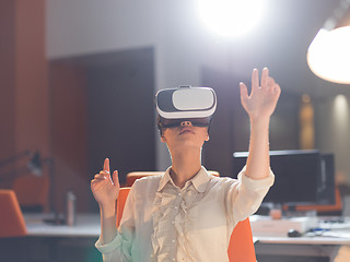 Image showing businesswoman using VR-headset glasses of virtual reality