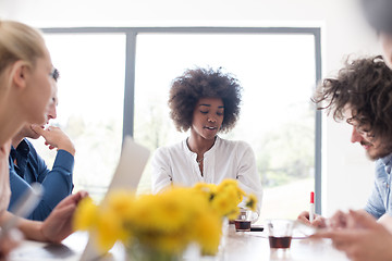 Image showing Multiethnic startup business team on meeting