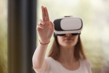 Image showing woman using VR-headset glasses of virtual reality