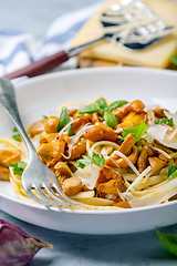 Image showing Pasta with wild chanterelles and parmesan.