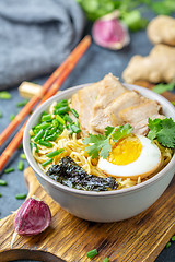 Image showing Ramen noodles with pork and pickled egg.