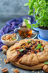 Image showing Galette pie with black currant for breakfast.