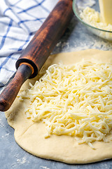 Image showing Preparation of traditional pie with cheese.