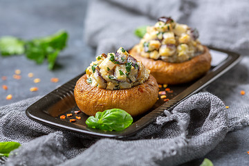 Image showing Baked mushrooms with minced eggplant and mushrooms.