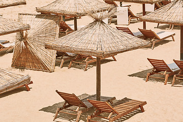 Image showing Umbrellas and Sun Loungers