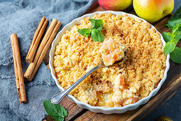 Image showing Apple crumble with cinnamon for breakfast.
