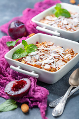 Image showing Delicious plum crumble for Breakfast.