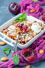 Image showing Delicious plum crumb with yogurt for Breakfast.
