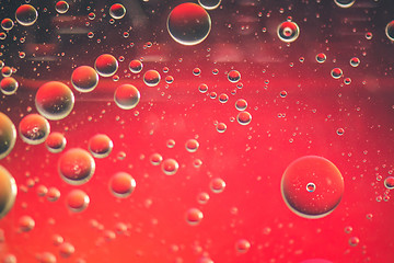 Image showing Red abstract background picture made with oil, water and soap