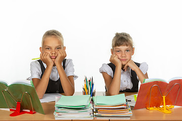 Image showing Two girls do not want to study in class