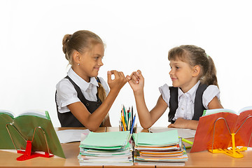 Image showing Classmates put up after a quarrel