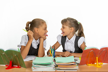 Image showing Classmates show each other language