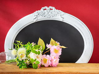 Image showing Spring decoration flowers and vintage frame