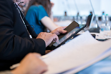 Image showing close up of business people hands using tablet computer