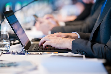 Image showing close up of business people hands using laptop computer