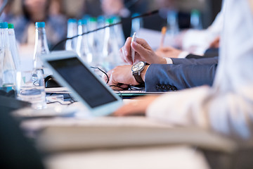 Image showing close up of business people hands using laptop computer