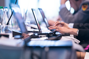 Image showing close up of business people hands using laptop computer