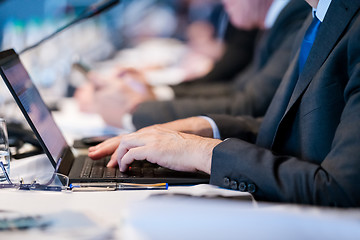 Image showing close up of business people hands using laptop computer