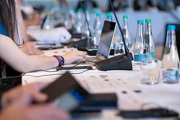 Image showing close up of business people hands using laptop computer