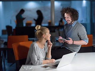 Image showing designers in the night startup office