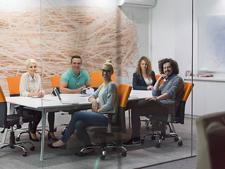 Image showing Startup Business Team At A Meeting at modern night office buildi