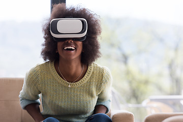 Image showing black woman using VR headset glasses of virtual reality