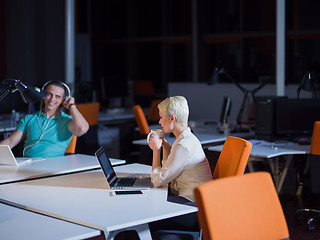 Image showing designers in the night startup office