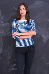 Image showing woman standing in front of chalk drawing board