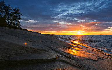 Image showing Golden Sunset in Stormy Sky over Lake Onega