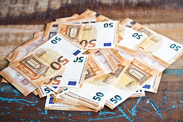 Image showing Pile of fifty euro banknotes. 