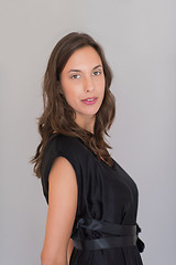 Image showing woman in a black dress isolated on white background