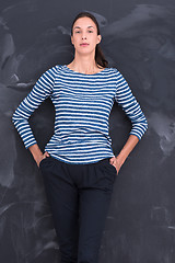 Image showing woman standing in front of chalk drawing board