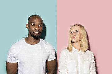 Image showing Man and woman posing at studio during quarrel