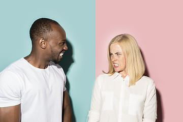 Image showing Man and woman posing at studio during quarrel