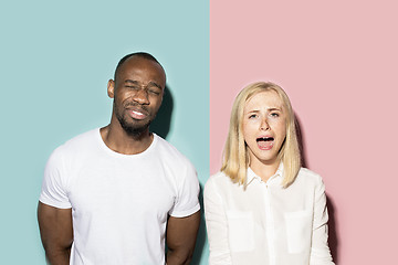 Image showing Man and woman posing at studio during quarrel