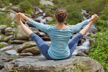Image showing Woman doing Ashtanga Vinyasa Yoga asana outdoors