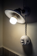 Image showing vintage lamp with a modern bulb