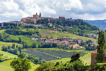 Image showing Camerino in Italy Marche over colourful fields