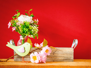 Image showing bird with a branch of blossoms easter holiday decoration backgro